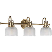 Progress P2992-163 Archie Collection Three-Light Vintage Brass Clear Double Prismatic Glass Coastal Bath Vanity Light Alternate Image.jpg