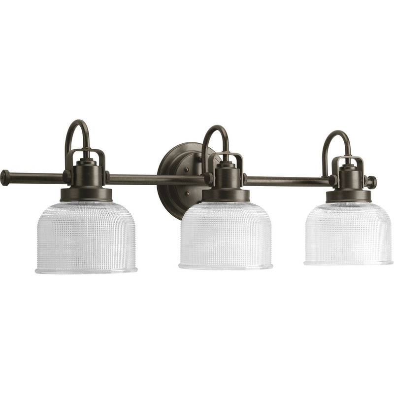 Progress P2992-74 Archie Collection Three-Light Venetian Bronze Clear Double Prismatic Glass Coastal Bath Vanity Light Main Image.jpg