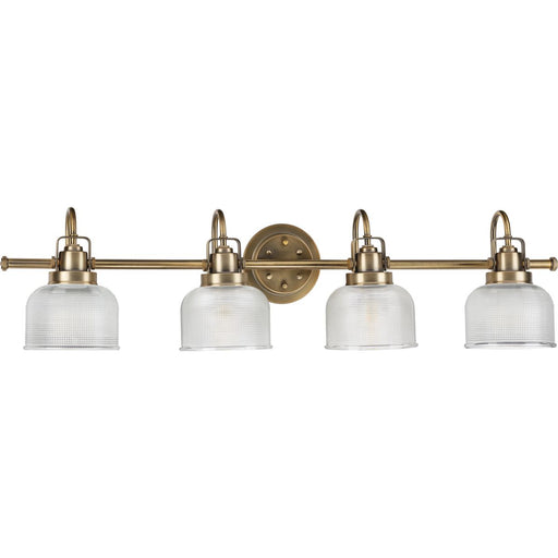 Progress P2997-163 Archie Collection Four-Light Vintage Brass Clear Double Prismatic Glass Coastal Bath Vanity Light Main Image.jpg