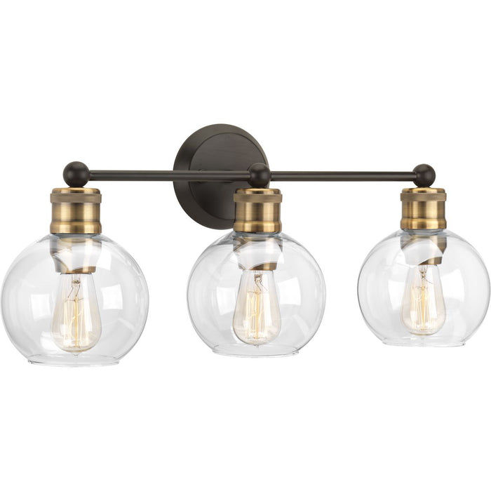 Progress P300051-020 Hansford Collection Three-Light Antique Bronze Clear Glass Coastal Bath Vanity Light Main Image.jpg
