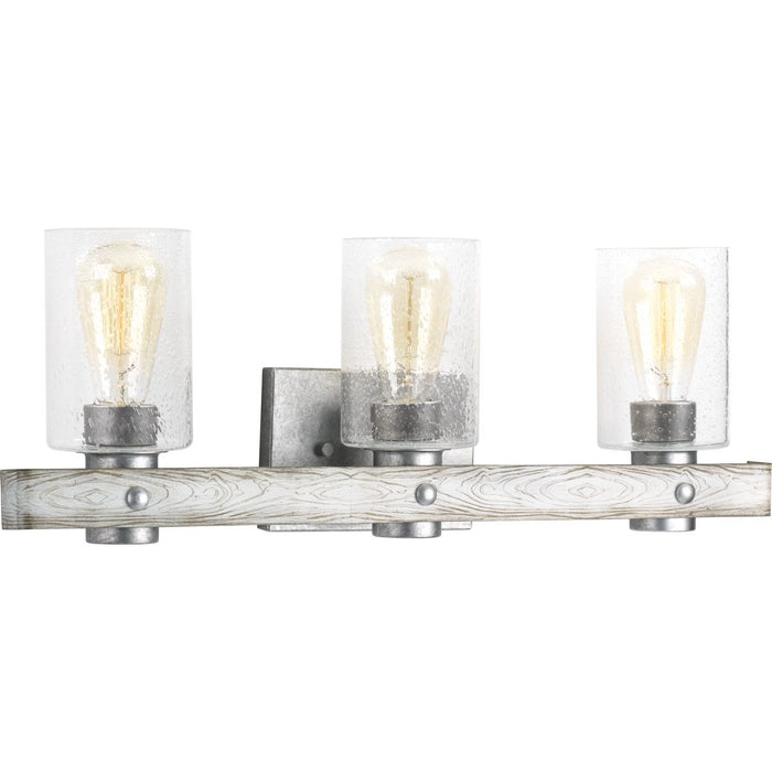 Progress P300125-141 Gulliver Collection Three-Light Galvanized Finish Clear Seeded Glass Coastal Bath Vanity Light Main Image.jpg