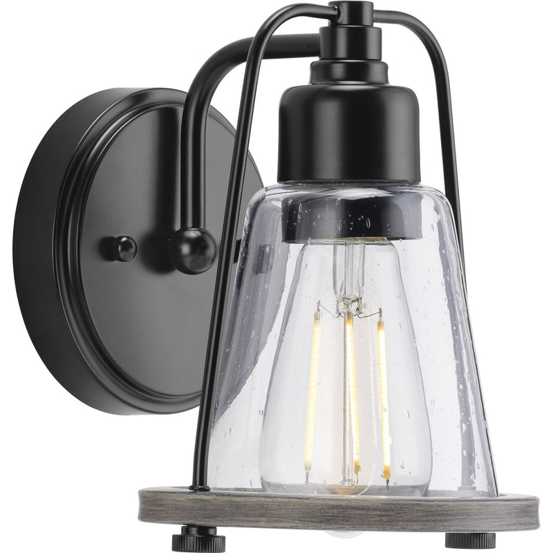 Progress P300295-031 Conway Collection One-Light Matte Black and Clear Seeded Farmhouse Style Bath Vanity Wall Light Main Image.jpg