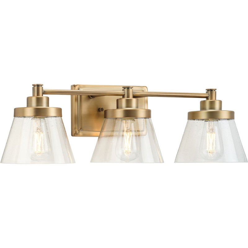 Progress P300350-163 Hinton Collection Three-Light Vintage Brass Clear Seeded Glass Farmhouse Bath Vanity Light Main Image.jpg