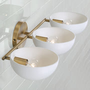 Capital Lighting 151431AW Reece Three Light Vanity, Aged Brass and White Alternate Image.jpg